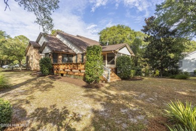 This beautiful 3-bedroom, 2-bathroom home is located in the on Sea Trail Golf Resort in North Carolina - for sale on GolfHomes.com, golf home, golf lot