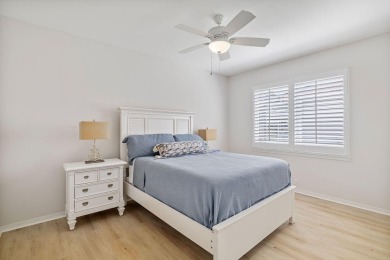 This beautifully updated home in the gated golf community of on Emerald Bay Golf Club in Florida - for sale on GolfHomes.com, golf home, golf lot