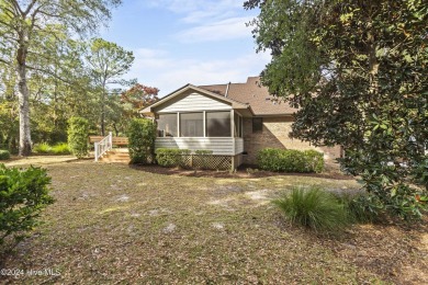 This beautiful 3-bedroom, 2-bathroom home is located in the on Sea Trail Golf Resort in North Carolina - for sale on GolfHomes.com, golf home, golf lot