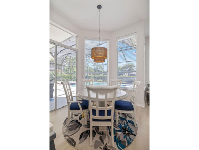 This beautifully updated home in the gated golf community of on Emerald Bay Golf Club in Florida - for sale on GolfHomes.com, golf home, golf lot