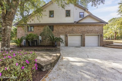 This beautiful 3-bedroom, 2-bathroom home is located in the on Sea Trail Golf Resort in North Carolina - for sale on GolfHomes.com, golf home, golf lot