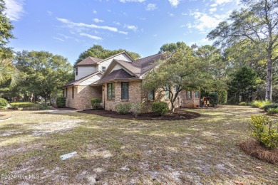 This beautiful 3-bedroom, 2-bathroom home is located in the on Sea Trail Golf Resort in North Carolina - for sale on GolfHomes.com, golf home, golf lot