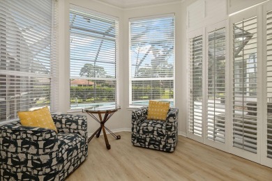 This beautifully updated home in the gated golf community of on Emerald Bay Golf Club in Florida - for sale on GolfHomes.com, golf home, golf lot