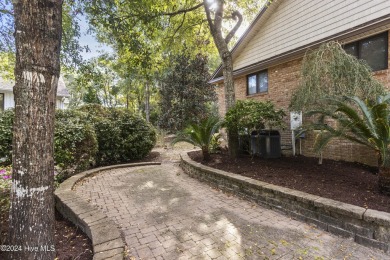 This beautiful 3-bedroom, 2-bathroom home is located in the on Sea Trail Golf Resort in North Carolina - for sale on GolfHomes.com, golf home, golf lot