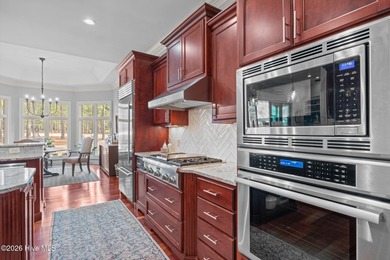 Stunning custom-built golf-front home overlooking the 2nd hole on Pinewild Country Club of Pinehurst in North Carolina - for sale on GolfHomes.com, golf home, golf lot