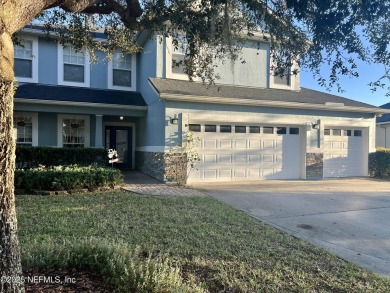 This large and unique home is a must see! It has a huge private on King and Bear Golf Course/World Golf Village in Florida - for sale on GolfHomes.com, golf home, golf lot