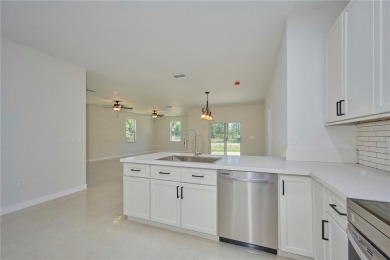 Come see the *Bella,* a gorgeous new construction home nestled on Indian Lake Estates Golf and Country Club in Florida - for sale on GolfHomes.com, golf home, golf lot