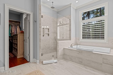 Stunning custom-built golf-front home overlooking the 2nd hole on Pinewild Country Club of Pinehurst in North Carolina - for sale on GolfHomes.com, golf home, golf lot