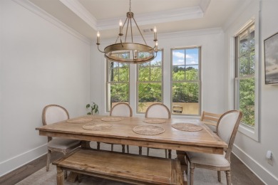 This charming home offers panoramic views of a serene pond in on Reynolds Lake Oconee - The Landing in Georgia - for sale on GolfHomes.com, golf home, golf lot