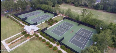 This large and unique home is a must see! It has a huge private on King and Bear Golf Course/World Golf Village in Florida - for sale on GolfHomes.com, golf home, golf lot