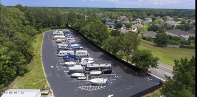 This large and unique home is a must see! It has a huge private on King and Bear Golf Course/World Golf Village in Florida - for sale on GolfHomes.com, golf home, golf lot