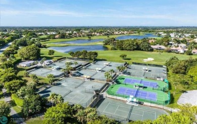 Completely remodeled condo with spectacular light and golf on Indian Spring Golf and Country Club in Florida - for sale on GolfHomes.com, golf home, golf lot