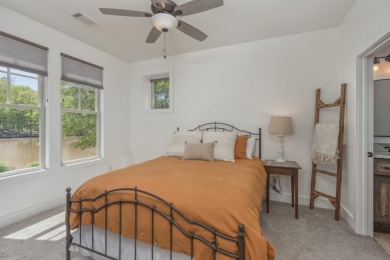 This charming home offers panoramic views of a serene pond in on Reynolds Lake Oconee - The Landing in Georgia - for sale on GolfHomes.com, golf home, golf lot