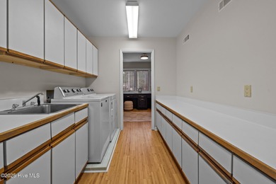 Distinguished by one of the finer settings in Pinewild's Country on Pinewild Country Club of Pinehurst in North Carolina - for sale on GolfHomes.com, golf home, golf lot