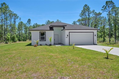 Come see the *Bella,* a gorgeous new construction home nestled on Indian Lake Estates Golf and Country Club in Florida - for sale on GolfHomes.com, golf home, golf lot