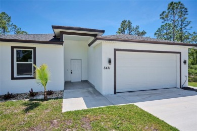 Come see the *Bella,* a gorgeous new construction home nestled on Indian Lake Estates Golf and Country Club in Florida - for sale on GolfHomes.com, golf home, golf lot