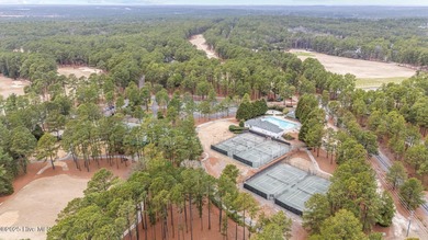 Distinguished by one of the finer settings in Pinewild's Country on Pinewild Country Club of Pinehurst in North Carolina - for sale on GolfHomes.com, golf home, golf lot