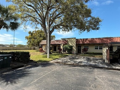 **Pro pics coming soon* This nicely updated, villa-style condo on The Dunedin Country Club in Florida - for sale on GolfHomes.com, golf home, golf lot