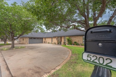 This sweet home, nestled on the 5th hole of Green Tree golf on Green Tree Country Club in Texas - for sale on GolfHomes.com, golf home, golf lot
