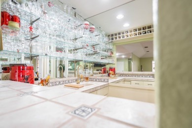 This sweet home, nestled on the 5th hole of Green Tree golf on Green Tree Country Club in Texas - for sale on GolfHomes.com, golf home, golf lot