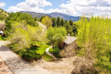 3 bedrooms on the main floor with 2 full baths and a half bath on Glenwood Springs Golf Club in Colorado - for sale on GolfHomes.com, golf home, golf lot