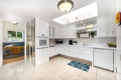 (CARPORT 36, SPACE 29). LIGHT AND BRIGHT Expanded 2 bedroom, 2 on Leisure World Seal Beach Golf Course in California - for sale on GolfHomes.com, golf home, golf lot