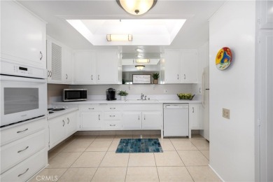 (CARPORT 36, SPACE 29). LIGHT AND BRIGHT Expanded 2 bedroom, 2 on Leisure World Seal Beach Golf Course in California - for sale on GolfHomes.com, golf home, golf lot
