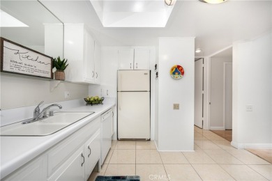 (CARPORT 36, SPACE 29). LIGHT AND BRIGHT Expanded 2 bedroom, 2 on Leisure World Seal Beach Golf Course in California - for sale on GolfHomes.com, golf home, golf lot