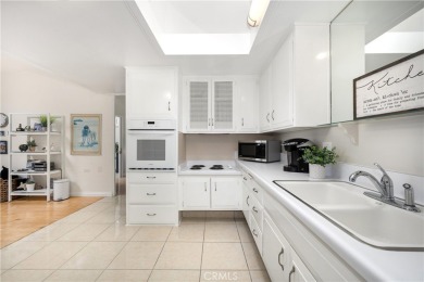 (CARPORT 36, SPACE 29). LIGHT AND BRIGHT Expanded 2 bedroom, 2 on Leisure World Seal Beach Golf Course in California - for sale on GolfHomes.com, golf home, golf lot