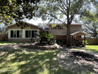 Come see this furnished, split level home that is move-in ready on Sunkist Country Club, Inc. in Mississippi - for sale on GolfHomes.com, golf home, golf lot