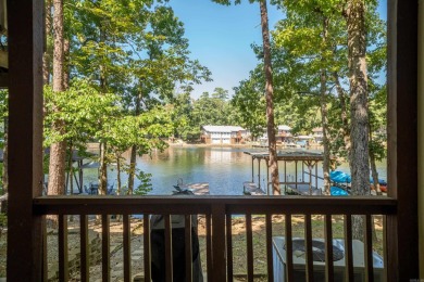 Walk outside your sliding back patio onto Lake DeSoto! This home on DeSoto Golf Course in Arkansas - for sale on GolfHomes.com, golf home, golf lot