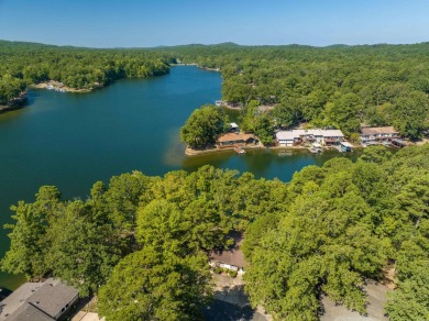 Walk outside your sliding back patio onto Lake DeSoto! This home on DeSoto Golf Course in Arkansas - for sale on GolfHomes.com, golf home, golf lot