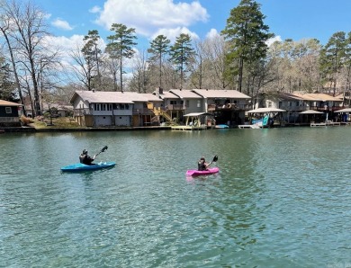 Walk outside your sliding back patio onto Lake DeSoto! This home on DeSoto Golf Course in Arkansas - for sale on GolfHomes.com, golf home, golf lot