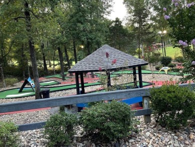 Walk outside your sliding back patio onto Lake DeSoto! This home on DeSoto Golf Course in Arkansas - for sale on GolfHomes.com, golf home, golf lot