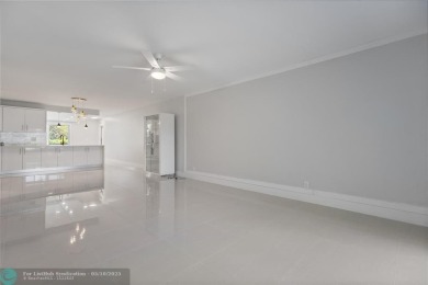 Large 2/2 corner unit on the first floor with a beautiful on Wynmoor Golf Course in Florida - for sale on GolfHomes.com, golf home, golf lot