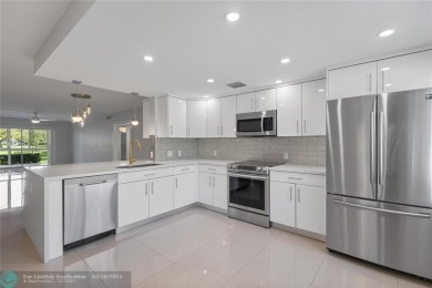 Large 2/2 corner unit on the first floor with a beautiful on Wynmoor Golf Course in Florida - for sale on GolfHomes.com, golf home, golf lot