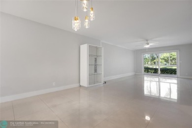 Large 2/2 corner unit on the first floor with a beautiful on Wynmoor Golf Course in Florida - for sale on GolfHomes.com, golf home, golf lot