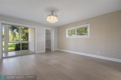 Large 2/2 corner unit on the first floor with a beautiful on Wynmoor Golf Course in Florida - for sale on GolfHomes.com, golf home, golf lot