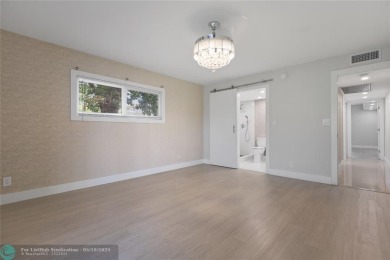 Large 2/2 corner unit on the first floor with a beautiful on Wynmoor Golf Course in Florida - for sale on GolfHomes.com, golf home, golf lot