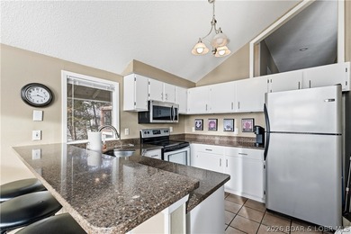 Located in the iconic Tan Tar A Estates, adjacent to on The Oaks Golf Course in Missouri - for sale on GolfHomes.com, golf home, golf lot