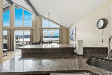 Located in the iconic Tan Tar A Estates, adjacent to on The Oaks Golf Course in Missouri - for sale on GolfHomes.com, golf home, golf lot