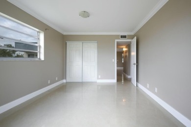 Discover this fully renovated, second-floor corner condo in on Kings Point Golf -Flanders Way in Florida - for sale on GolfHomes.com, golf home, golf lot