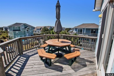 Stunning Semi-Oceanfront Retreat at 604 Saltspray Court, Corolla on The Currituck Golf Club in North Carolina - for sale on GolfHomes.com, golf home, golf lot