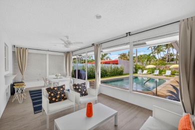 This stunning model home is tucked into the north end of the on Lake Worth Municipal Golf Course in Florida - for sale on GolfHomes.com, golf home, golf lot