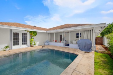 This stunning model home is tucked into the north end of the on Lake Worth Municipal Golf Course in Florida - for sale on GolfHomes.com, golf home, golf lot