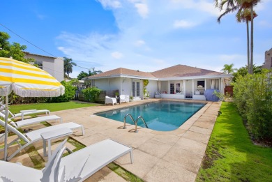 This stunning model home is tucked into the north end of the on Lake Worth Municipal Golf Course in Florida - for sale on GolfHomes.com, golf home, golf lot