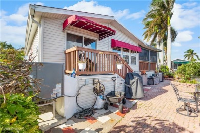 Don't miss out on this mobile home with breathtaking lake views on Silver Lakes Resort and Golf Club in Florida - for sale on GolfHomes.com, golf home, golf lot