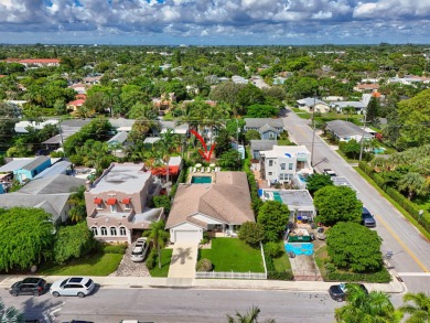 This stunning model home is tucked into the north end of the on Lake Worth Municipal Golf Course in Florida - for sale on GolfHomes.com, golf home, golf lot