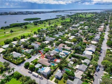 This stunning model home is tucked into the north end of the on Lake Worth Municipal Golf Course in Florida - for sale on GolfHomes.com, golf home, golf lot