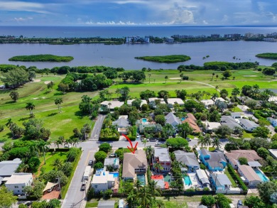 This stunning model home is tucked into the north end of the on Lake Worth Municipal Golf Course in Florida - for sale on GolfHomes.com, golf home, golf lot